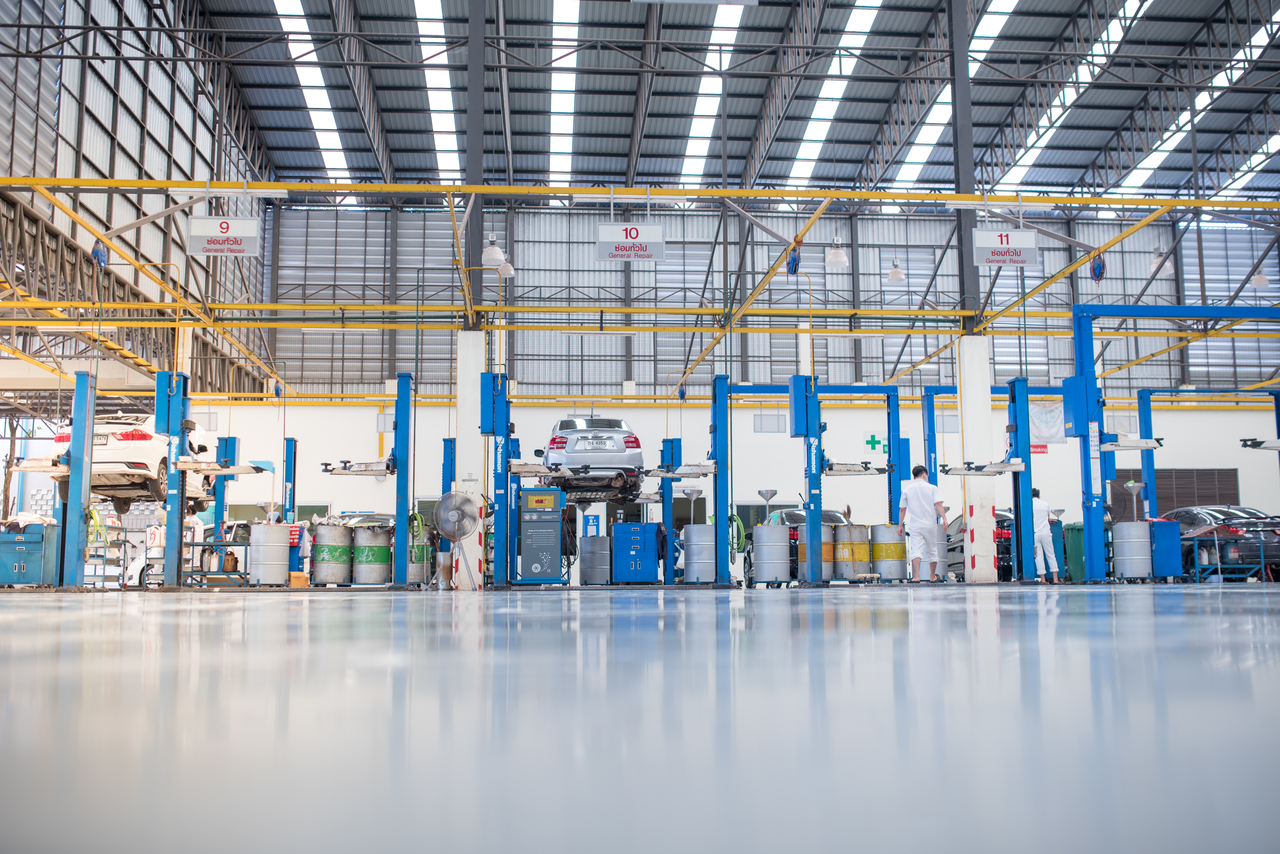 Low angle of a car repair shop with epoxy flooring