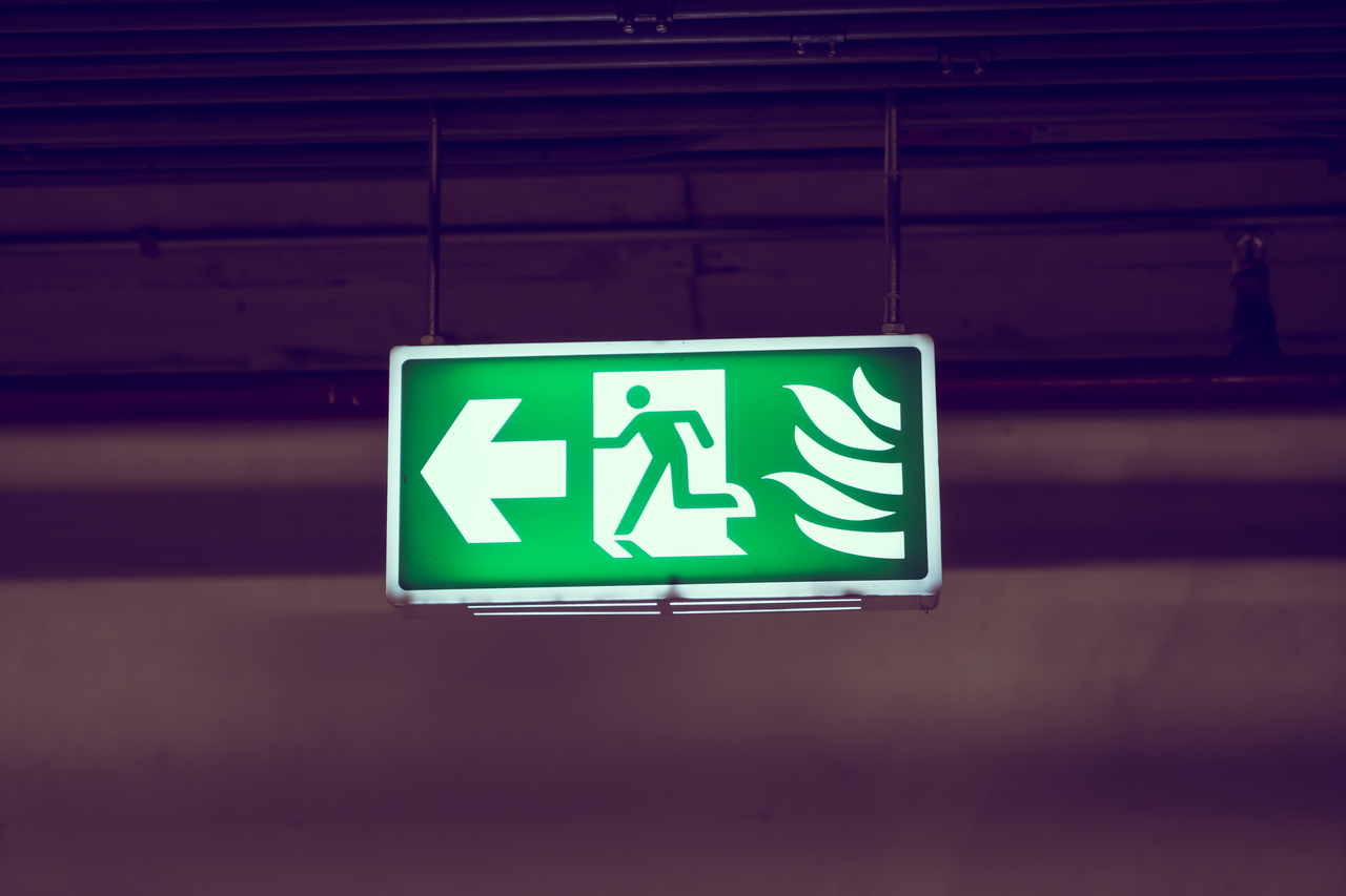 A glowing fire exit sign