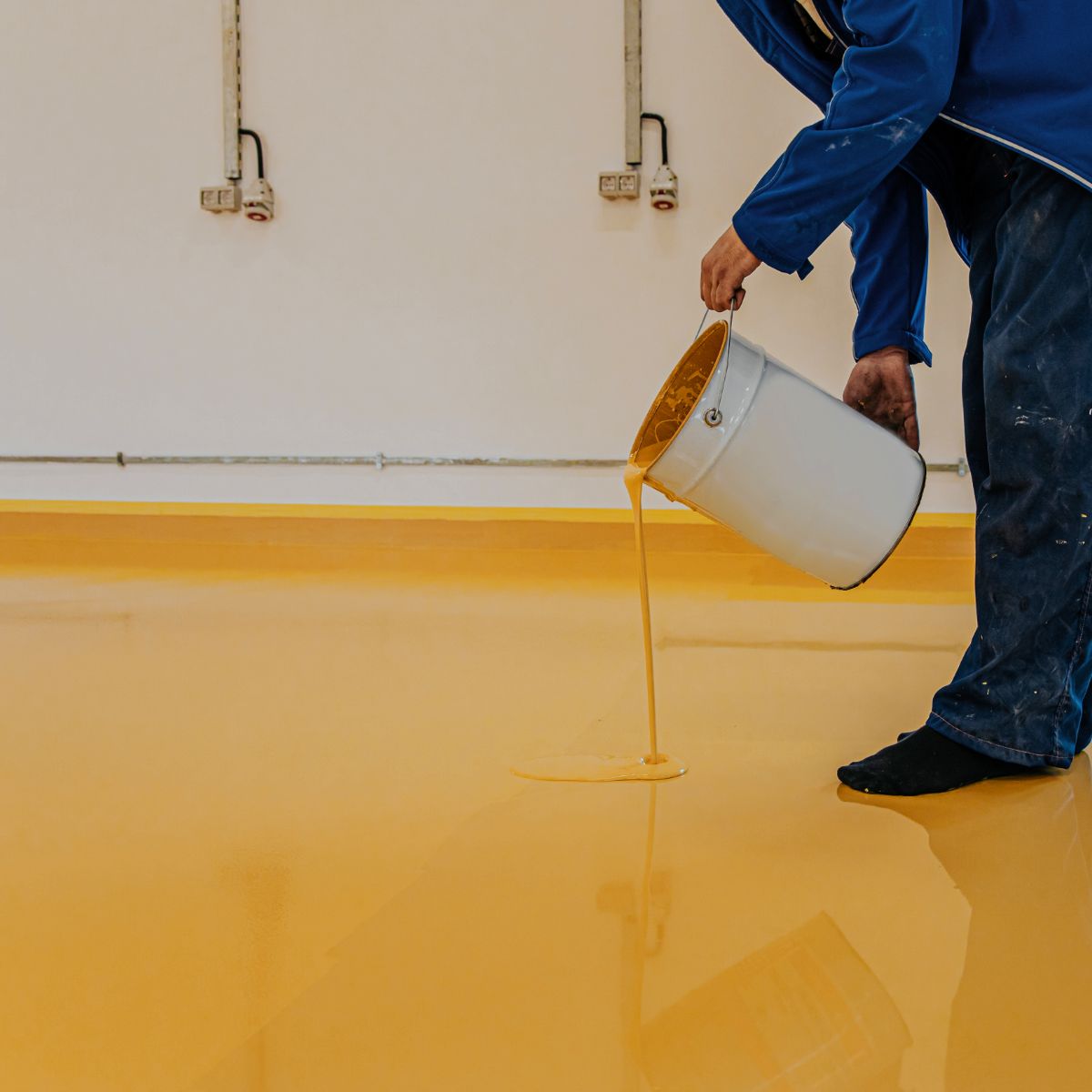 Worker Coating Floor With Self Leveling Epoxy Res 2022 11 29 00 02 46 Utc (1) (1)