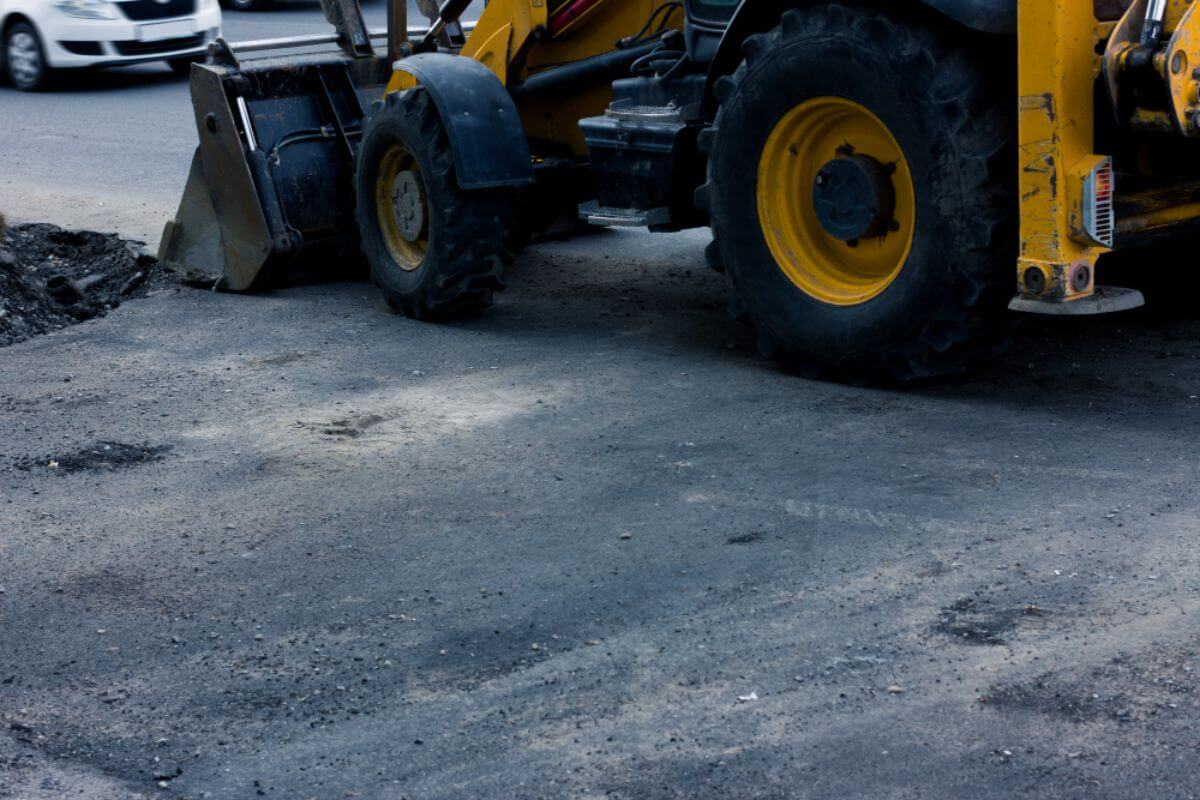 Industrial floor showing wear caused by heavy machinery and continuous foot traffic